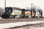 Vehicle train rolls west through University